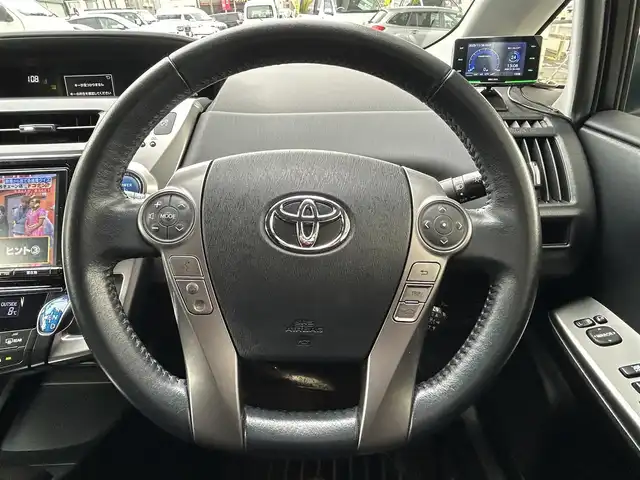 トヨタ プリウス α G 岩手県 2017(平29)年 6.5万km スーパーホワイトⅡ 純正ナビNSZT-Y66T/バックカメラ /ハーフレザーシート /フルセグTV /フロントカメラ /レーダークルコン/衝突軽減装置 /運転席パワーシート /ビルトインETC /社外ドラレコ /社外GPSレーダー /オートハイビーム/オートライト/フォグランプ/オールオートPW/革巻きステアリング/ナビステアリングスイッチ/純正エンジンスターター/スマートキー×2/リアワイパー/ルーフボックスTHULE/社外AWスタッドレスタイヤ/(205/60/R16　2024年製7分山)/ドアバイザー/フロアマット/保証書　取説　ナビ取説