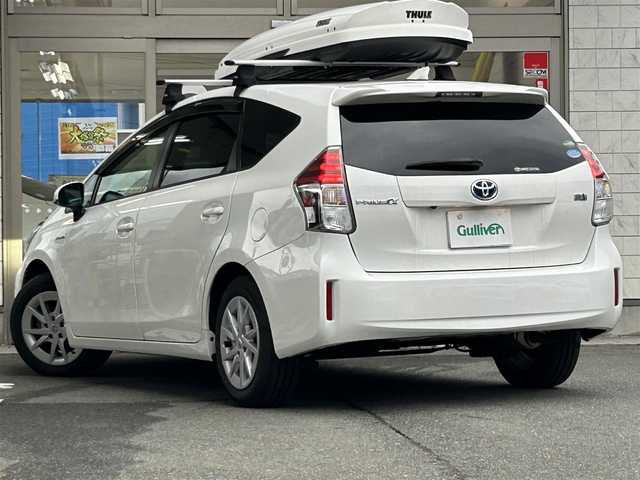 トヨタ プリウス α G 岩手県 2017(平29)年 6.5万km スーパーホワイトⅡ 純正ナビNSZT-Y66T/バックカメラ /ハーフレザーシート /フルセグTV /フロントカメラ /レーダークルコン/衝突軽減装置 /運転席パワーシート /ビルトインETC /社外ドラレコ /社外GPSレーダー /オートハイビーム/オートライト/フォグランプ/オールオートPW/革巻きステアリング/ナビステアリングスイッチ/純正エンジンスターター/スマートキー×2/リアワイパー/ルーフボックスTHULE/社外AWスタッドレスタイヤ/(205/60/R16　2024年製7分山)/ドアバイザー/フロアマット/保証書　取説　ナビ取説