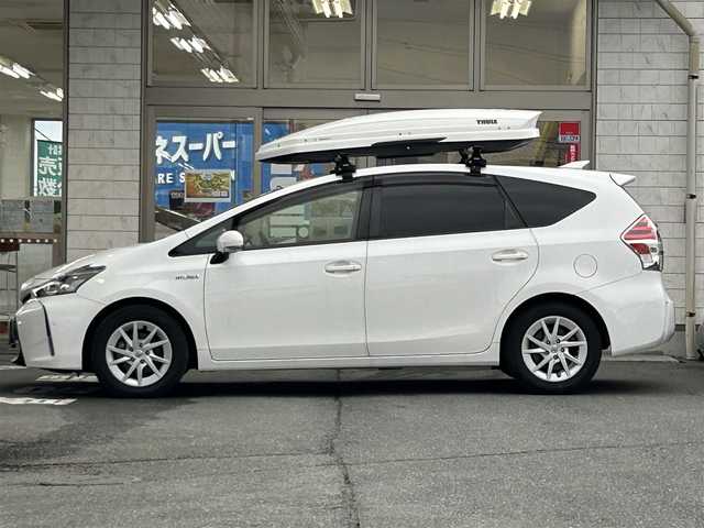 トヨタ プリウス α G 岩手県 2017(平29)年 6.5万km スーパーホワイトⅡ 純正ナビNSZT-Y66T/バックカメラ /ハーフレザーシート /フルセグTV /フロントカメラ /レーダークルコン/衝突軽減装置 /運転席パワーシート /ビルトインETC /社外ドラレコ /社外GPSレーダー /オートハイビーム/オートライト/フォグランプ/オールオートPW/革巻きステアリング/ナビステアリングスイッチ/純正エンジンスターター/スマートキー×2/リアワイパー/ルーフボックスTHULE/社外AWスタッドレスタイヤ/(205/60/R16　2024年製7分山)/ドアバイザー/フロアマット/保証書　取説　ナビ取説