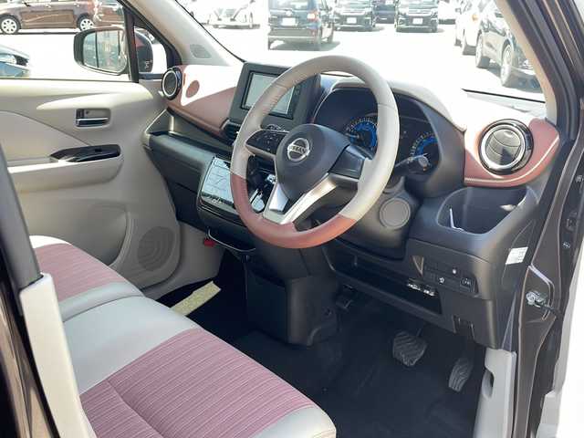 日産 デイズ ボレロ 道東・釧路十勝 2021(令3)年 2.5万km 茶Ⅱ ・４WD/・社外SDメモリナビ/（CD・AM・FM・BT・ワンセグ）/・バックカメラ/・エマージェンシーブレーキ/・ハーフレザーシートヒーター/・前席シートヒーター/・スマートキー/・プッシュスタート/・ＥＴＣ　/・ステアリングスイッチ/・ボレロ専用14インチアルミホイール/・純正フロアマット/・電動格納ミラー/・スマートキー/・プッシュスタート