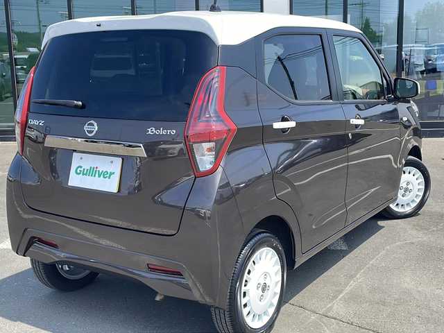 日産 デイズ ボレロ 道東・釧路十勝 2021(令3)年 2.5万km 茶Ⅱ ・４WD/・社外SDメモリナビ/（CD・AM・FM・BT・ワンセグ）/・バックカメラ/・エマージェンシーブレーキ/・ハーフレザーシートヒーター/・前席シートヒーター/・スマートキー/・プッシュスタート/・ＥＴＣ　/・ステアリングスイッチ/・ボレロ専用14インチアルミホイール/・純正フロアマット/・電動格納ミラー/・スマートキー/・プッシュスタート