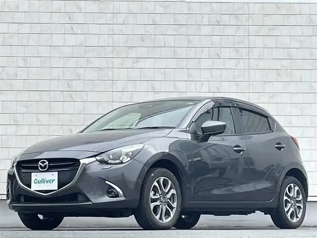 マツダ デミオ XD ツーリング Lパッケージ 岩手県 2018(平30)年 5.4万km マシーングレープレミアムM 禁煙車/4WD/ディーゼル/純正エンジンスターター/前席シートヒーター/レーンキープアシスト/衝突軽減システム/横滑り防止装置/純正ナビ/→フルセグTV/Bluetooth/CD/DVD/FM/AM/AUX/バックカメラ/ヘッドアップディスプレイ/ステアリングスイッチ/クルーズコントロール/パドルシフト/オートライト/フォグライト/〇電動格納ミラー/〇ウィンカーミラー/〇ドアバイザー/〇フロアマット/〇USBポート2つ/〇シガーソケット/〇プッシュスタート/ETC/冬タイヤ社外アルミホイール車載