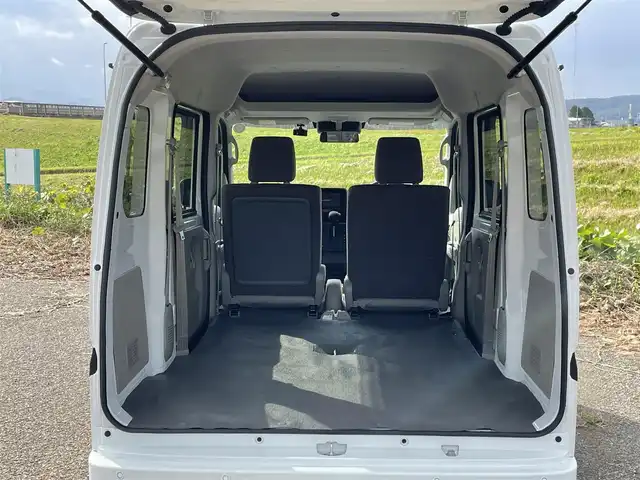 スズキ エブリイ PC 新潟県 2025(令7)年 0.2万km スペリアホワイト 4WD/社外SDナビ(AVN-LBS01)/BT/バックカメラ/ドライブレコーダー/衝突被害軽減ブレーキ/レーンキープアシスト/運転席シートヒーター/コーナーセンサー/リモコンキー /LEDヘッドライト/オートライト/オートハイビーム