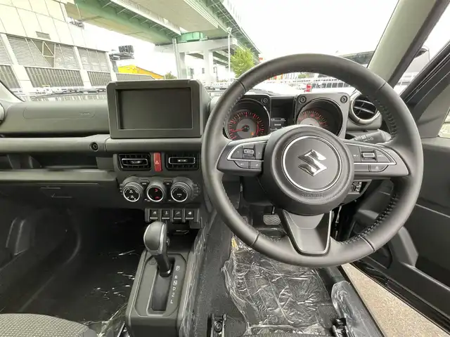 スズキ ジムニー ノマド FC 愛知県 2025(令7)年 0.3万km 黒 4WD/スズキセーフティサポート/デュアルブレーキサポート/アクティブクルーズコントロール/クリアランスソナー/アイドリングストップ/オートライト/純正15インチAW/前席シートイーター/ドアミラーヒーター/LEDヘッドライト