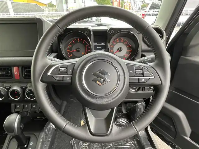 スズキ ジムニー ノマド FC 愛知県 2025(令7)年 0.3万km 黒 4WD/スズキセーフティサポート/デュアルブレーキサポート/アクティブクルーズコントロール/クリアランスソナー/アイドリングストップ/オートライト/純正15インチAW/前席シートイーター/ドアミラーヒーター/LEDヘッドライト
