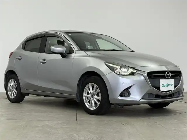 マツダ デミオ 13S ツーリング 愛知県 2016(平28)年 6.3万km アルミニウムメタリック 純正8インチナビ/フルセグTV/i-ACTIVSENSE/アドバンス・スマート・シティ・ブレーキ・サポート/横滑り防止装置/コーナーセンサー/レーンキープアシストシステム/オートライト/オートマチックハイビーム/ブラインドスポットモニター/ヘッドアップディスプレイ/LEDヘッドライト/フォグランプ/シートヒーター/ETC/純正15インチアルミホイール/純正フロアマット/プッシュスタート/スマートキー