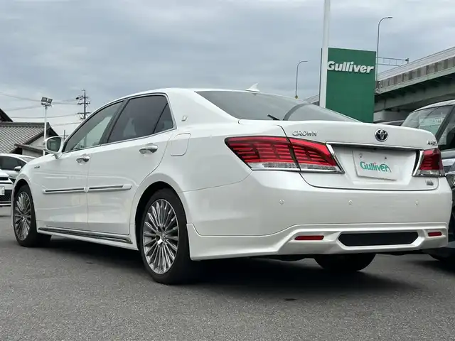 トヨタ クラウン マジェスタ Fバージョン 愛知県 2014(平26)年 7.1万km ホワイトパールクリスタルシャイン サンルーフ/純正8型ナビ/フルセグTV/パノラミックビューモニター/ビルトインETC/ドライブレコーダー/レーダークルーズコントロール/インテリジェントクリアランスソナー/ミリ波レーダー方式プリクラッシュセーフティシステム/統合車両姿勢安定制御システム/・横滑り防止装置/・トラクションコントロールシステム/・電動パワーステアリング/ブラインドスポットモニター/LEDヘッドランプ/デュアルオートエアコン/本木製/革巻きコンビステアリング/ステアリングヒーター/ステアリングスイッチ/ブラック革シート/全席パワーシート/シートヒーター/前席シートベンチレーション/純正OP18インチアルミホイール/レーダー探知機/純正フロアマット