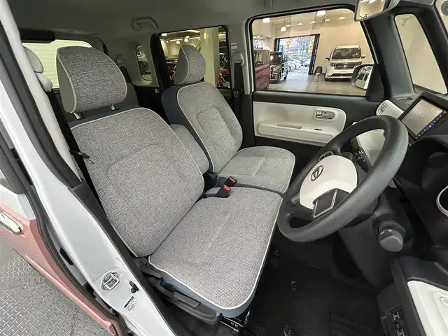 ダイハツ ムーヴ キャンバス ストライプス G 愛媛県 2023(令5)年 0.1万km シャイニングホワイトパール/アプリコットピンクメタリック 純正メモリーナビ/ CD/DVD/Bluetooth/フルセグ/パノラマモニター/両側パワースライドドア/スマートアシスト/衝突被害軽減ブレーキ/車線逸脱警報/誤発進抑制機能/先行車発進告知/アダプティブドライビングビーム/LEDヘッドライト/電動パーキングブレーキ/オートブレーキホールド/シートヒーター/ホッドリンクホルダー/電動パーキング/コーナーセンサー/純正フロアマット