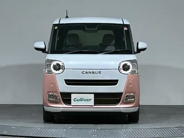 ダイハツ ムーヴ キャンバス ストライプス G 愛媛県 2023(令5)年 0.1万km シャイニングホワイトパール/アプリコットピンクメタリック 純正メモリーナビ/ CD/DVD/Bluetooth/フルセグ/パノラマモニター/両側パワースライドドア/スマートアシスト/衝突被害軽減ブレーキ/車線逸脱警報/誤発進抑制機能/先行車発進告知/アダプティブドライビングビーム/LEDヘッドライト/電動パーキングブレーキ/オートブレーキホールド/シートヒーター/ホッドリンクホルダー/電動パーキング/コーナーセンサー/純正フロアマット