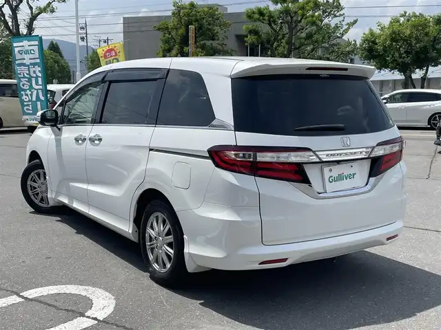 ホンダ オデッセイ G 長野県 2013(平25)年 10.7万km ホワイトオーキッドパール 純正ナビ（FM/AM、CD、DVD、BT）/バックカメラ/フルセグテレビ/クルーズコントロール追従無/両側パワースライド/レーンキープアシスト/横滑り防止装置/盗難防止装置/アイドリングストップ/LEDオートライト/リモコンキー/ワンオーナー/MTモード付AT/社外フロアマット/保証書