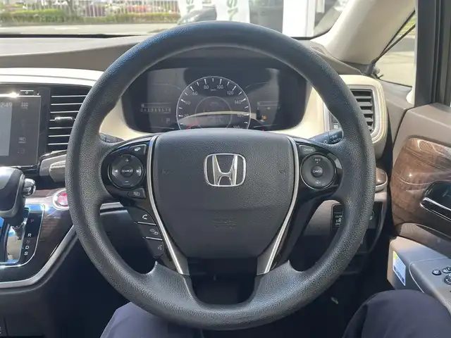 ホンダ オデッセイ G 長野県 2013(平25)年 10.7万km ホワイトオーキッドパール 純正ナビ（FM/AM、CD、DVD、BT）/バックカメラ/フルセグテレビ/クルーズコントロール追従無/両側パワースライド/レーンキープアシスト/横滑り防止装置/盗難防止装置/アイドリングストップ/LEDオートライト/リモコンキー/ワンオーナー/MTモード付AT/社外フロアマット/保証書