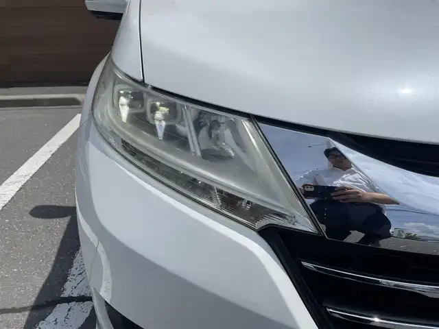 ホンダ オデッセイ G 長野県 2013(平25)年 10.7万km ホワイトオーキッドパール 純正ナビ（FM/AM、CD、DVD、BT）/バックカメラ/フルセグテレビ/クルーズコントロール追従無/両側パワースライド/レーンキープアシスト/横滑り防止装置/盗難防止装置/アイドリングストップ/LEDオートライト/リモコンキー/ワンオーナー/MTモード付AT/社外フロアマット/保証書