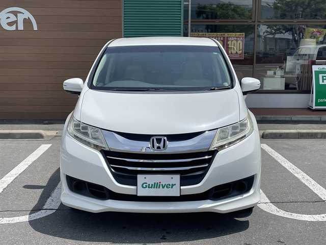 ホンダ オデッセイ G 道央・札幌 2013(平25)年 10.7万km ホワイトオーキッドパール 純正ナビ（FM/AM、CD、DVD、BT）/４WD/バックカメラ/フルセグテレビ/クルーズコントロール追従無/両側パワースライド/レーンキープアシスト/横滑り防止装置/盗難防止装置/アイドリングストップ/LEDオートライト/リモコンキー/ワンオーナー/MTモード付AT/社外フロアマット/保証書