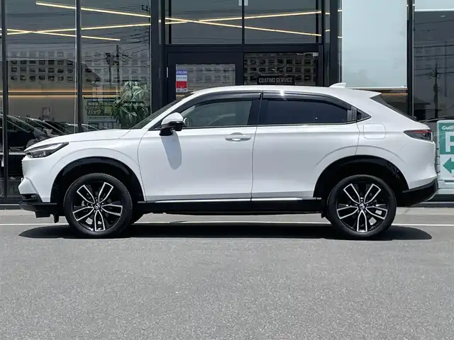 ホンダ ヴェゼル ハイブリッド e:HEV Z 茨城県 2023(令5)年 5.3万km プラチナホワイトパール 純正ナビ/【AM・FM・TV・BT・USB】/ステアリングヒーター/BSM/ワイヤレス充電/レーダークルコン/ETC2.0/Bカメラ/電動リアゲート/パドルシフト/前後コーナーセンサー/ハーフレザーシート/ダウンヒルアシストコントロール/ブレーキホールド/ステリモ/純正フロアマット/純正アルミホイール/オートライト/LEDライト