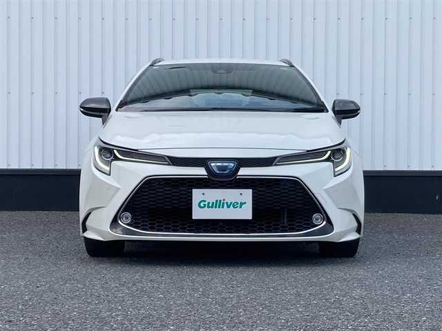 トヨタ カローラツーリング ハイブリッド ダブルバイビー 千葉県 2020(令2)年 6.4万km ホワイトパールクリスタルシャイン 純正9インチナビ/(フルセグTV BT CD DVD FM AM)/バックカメラ/衝突被害軽減システム/車線逸脱警報/クルーズコントロール/ハーフレザーシート/横滑り防止装置/ビルトインETC/アイドリングストップ/LEDヘッドライト/フォグランプ/オートライト/ウィンカーミラー/電動格納ミラー/純正17インチAW/シートヒーター/シートリフター/ステアリングヒーター/プッシュスタート/スマートキー/フロアマット/ドアバイザー/スペアキー/取扱説明書/保証書