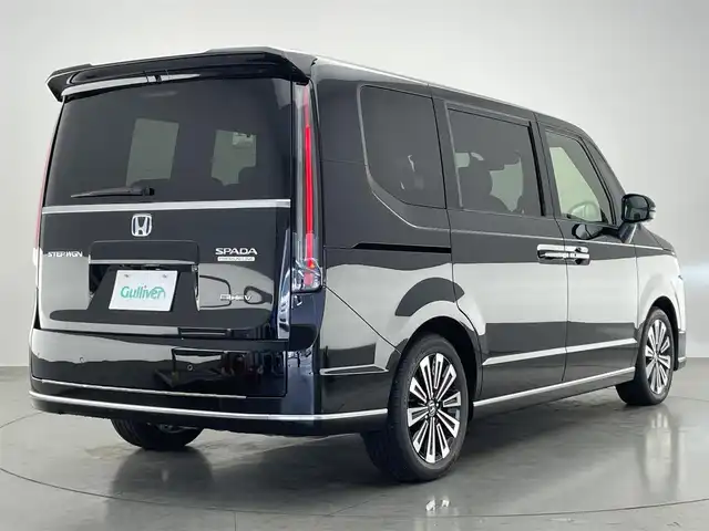 ホンダ ステップワゴン スパーダ eHEV プレミアムライン 愛知県 2024(令6)年 1.4万km クリスタルブラックパール 純正１１．４型ナビ　オートサイドステップ　全方位カメラ　禁煙車　ＢＳＭ　ハーフレザー　シートヒーター　ホンダセンシング　衝突軽減装置　追従クルコン　前後ドラレコ　電動リアゲート　オットマン　パドルシフト　ＬＥＤオートライト　HDMIポート　ETC2.0　コーナーセンサー　
