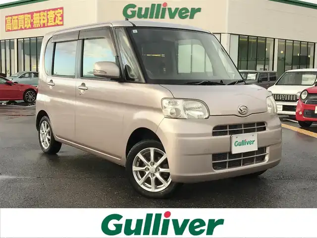 ダイハツ タント G 鳥取県 2011(平23)年 7.3万km ライトローズマイカメタリック ワンオーナー/４・W・D/社外CDオーディオ/片側パワースライドドア/ハロゲンヘットライト/純正14インチアルミホイール/純正フロアマット/スマートキー/ドアバイザー/保証書・取扱説明書