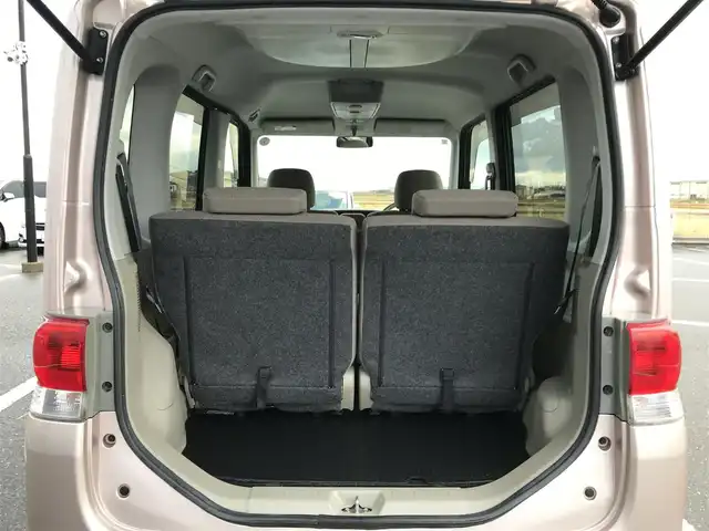 ダイハツ タント G 鳥取県 2011(平23)年 7.3万km ライトローズマイカメタリック ワンオーナー/４・W・D/社外CDオーディオ/片側パワースライドドア/ハロゲンヘットライト/純正14インチアルミホイール/純正フロアマット/スマートキー/ドアバイザー/保証書・取扱説明書