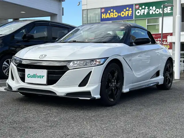 ホンダ Ｓ６６０ α 特別仕様車ブルーノレザーED 長崎県 2018(平30)年 1.2万km プレミアムスターホワイトP ワンオーナー車両/純正ディスプレイオーディオ（AM、FM、ハンズフリー）/バックカメラ/プッシュスタート/6MT/HDMI/革巻きステアリング/ステアリングリモコン/電動調整ミラー/茶革ハーフレザーシート/クルーズコントロール/オートライト/横滑り防止機能/ETC/無限フロアマット/無限ハードトップ/ソフトトップ（車載）/HKSマフラー/純正マフラー（車載）/スペアキー/取扱説明書/保証書