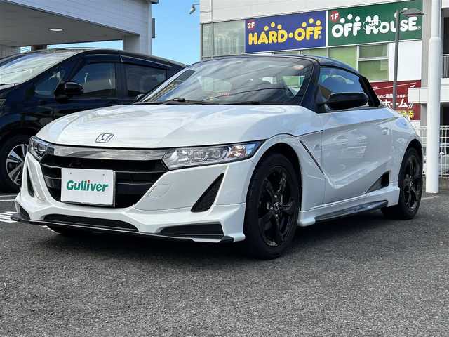 ホンダ Ｓ６６０ α 特別仕様車ブルーノレザーED 長崎県 2018(平30)年 1.2万km プレミアムスターホワイトP ワンオーナー車両/純正ディスプレイオーディオ（AM、FM、ハンズフリー）/バックカメラ/プッシュスタート/6MT/HDMI/革巻きステアリング/ステアリングリモコン/電動調整ミラー/茶革ハーフレザーシート/クルーズコントロール/オートライト/横滑り防止機能/ETC/無限フロアマット/無限ハードトップ/ソフトトップ（車載）/HKSマフラー/純正マフラー（車載）/スペアキー/取扱説明書/保証書