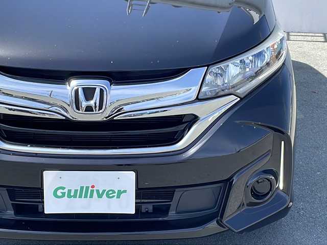 ホンダ フリード G ホンダセンシング 三重県 2018(平30)年 11.6万km プレミアムスパークルブラックパール プッシュスタート/スマートキー×2/純正ホイールカバー/CMBS(突進軽減ブレーキ)/ACC(クルーズコントロール)/先行車発進お知らせ/路外逸脱抑制システム/レーンキープアシスト/標識認識機能/ステアリングスイッチ/前方ドライブレコーダー/純正SDナビ(AM/FM/CD/DVD/TV/BT)/フルセグTV/バックカメラ/両側パワースライドドア/ビルトインETC/ワイパーデアイサー/電動格納ミラー/ロールサンシェード/ウィンカーミラー/保証書/ワンオーナー