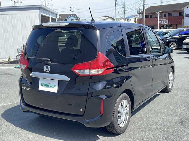 ホンダ フリード G ホンダセンシング 三重県 2018(平30)年 11.6万km プレミアムスパークルブラックパール プッシュスタート/スマートキー×2/純正ホイールカバー/CMBS(突進軽減ブレーキ)/ACC(クルーズコントロール)/先行車発進お知らせ/路外逸脱抑制システム/レーンキープアシスト/標識認識機能/ステアリングスイッチ/前方ドライブレコーダー/純正SDナビ(AM/FM/CD/DVD/TV/BT)/フルセグTV/バックカメラ/両側パワースライドドア/ビルトインETC/ワイパーデアイサー/電動格納ミラー/ロールサンシェード/ウィンカーミラー/保証書/ワンオーナー