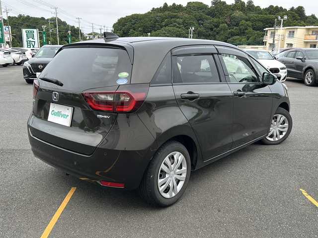 ホンダ フィット e:HEVホーム 茨城県 2020(令2)年 6.8万km プレミアムグラマラスブロンズP ホンダセンシング/純正ナビ/　　CD/DVD/SD/BT/フルセグ/バックカメラ/クルーズコントロール追従走行/LEDオートライト/ハーフレザー/純正15インチアルミホイール/スマートキー/ETC