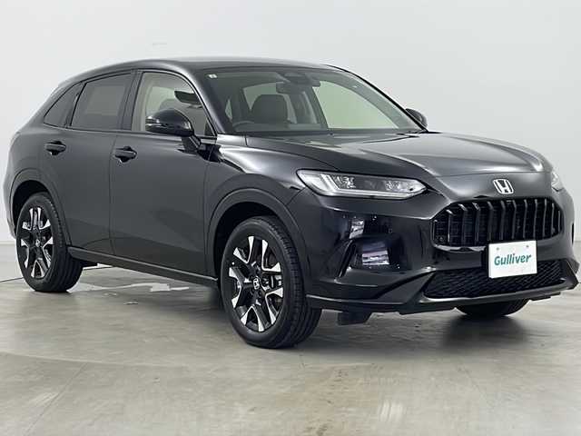 ホンダ ＺＲ－Ｖ Z 道央・札幌 2024(令6)年 0.4万km クリスタルブラックパール ・4WD/・寒冷地仕様/・純正ナビ&BT&USB&フルセグTV/・BOSEプレミアムサウンド/・マルチビューカメラシステム/・バックカメラ/・ホンダセンシング/・衝突軽減ブレーキ/・誤発進抑制機能/・後方誤発進抑制機能/・近距離衝突軽減ブレーキ/・歩行者事故低減ステアリング/・路外逸脱抑制機能/・渋滞追従機能付アダプティブクルーズコントロール/・車線維持支援システム/・トラフィックジャムアシスト/・先行車発進お知らせ機能/・標識認識機能/・ブラインドスポットインフォメーション/・パーキングセンサーシステム/・全席シートヒーター/・前席パワーシート/・D席シートメモリ/・レザーシート/・ステアリングヒーター/・パドルシフト/・置くだけ充電/・純正前方ドライブレコーダー/・ビルトインETC2.0/・LEDヘッドライト/・オートライト/・オートマチックハイビーム/・スマートキー/・スペアキー/・取扱説明書