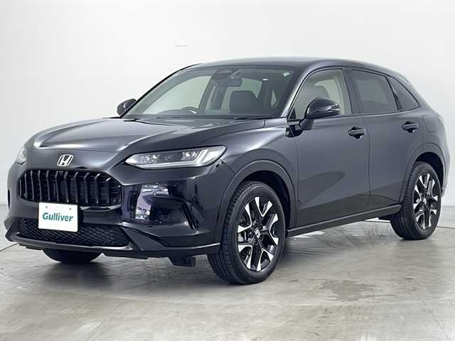 ホンダ ＺＲ－Ｖ Z 道央・札幌 2024(令6)年 0.4万km クリスタルブラックパール ・4WD/・寒冷地仕様/・純正ナビ&BT&USB&フルセグTV/・BOSEプレミアムサウンド/・マルチビューカメラシステム/・バックカメラ/・ホンダセンシング/・衝突軽減ブレーキ/・誤発進抑制機能/・後方誤発進抑制機能/・近距離衝突軽減ブレーキ/・歩行者事故低減ステアリング/・路外逸脱抑制機能/・渋滞追従機能付アダプティブクルーズコントロール/・車線維持支援システム/・トラフィックジャムアシスト/・先行車発進お知らせ機能/・標識認識機能/・ブラインドスポットインフォメーション/・パーキングセンサーシステム/・全席シートヒーター/・前席パワーシート/・D席シートメモリ/・レザーシート/・ステアリングヒーター/・パドルシフト/・置くだけ充電/・純正前方ドライブレコーダー/・ビルトインETC2.0/・LEDヘッドライト/・オートライト/・オートマチックハイビーム/・スマートキー/・スペアキー/・取扱説明書