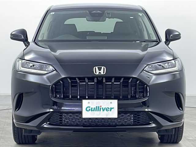ホンダ ＺＲ－Ｖ Z 道央・札幌 2024(令6)年 0.4万km クリスタルブラックパール ・4WD/・寒冷地仕様/・純正ナビ&BT&USB&フルセグTV/・BOSEプレミアムサウンド/・マルチビューカメラシステム/・バックカメラ/・ホンダセンシング/・衝突軽減ブレーキ/・誤発進抑制機能/・後方誤発進抑制機能/・近距離衝突軽減ブレーキ/・歩行者事故低減ステアリング/・路外逸脱抑制機能/・渋滞追従機能付アダプティブクルーズコントロール/・車線維持支援システム/・トラフィックジャムアシスト/・先行車発進お知らせ機能/・標識認識機能/・ブラインドスポットインフォメーション/・パーキングセンサーシステム/・全席シートヒーター/・前席パワーシート/・D席シートメモリ/・レザーシート/・ステアリングヒーター/・パドルシフト/・置くだけ充電/・純正前方ドライブレコーダー/・ビルトインETC2.0/・LEDヘッドライト/・オートライト/・オートマチックハイビーム/・スマートキー/・スペアキー/・取扱説明書