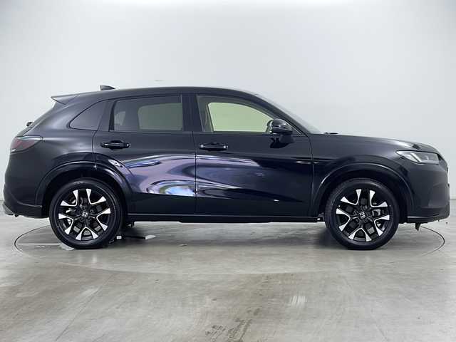 ホンダ ＺＲ－Ｖ Z 道央・札幌 2024(令6)年 0.4万km クリスタルブラックパール ・4WD/・寒冷地仕様/・純正ナビ&BT&USB&フルセグTV/・BOSEプレミアムサウンド/・マルチビューカメラシステム/・バックカメラ/・ホンダセンシング/・衝突軽減ブレーキ/・誤発進抑制機能/・後方誤発進抑制機能/・近距離衝突軽減ブレーキ/・歩行者事故低減ステアリング/・路外逸脱抑制機能/・渋滞追従機能付アダプティブクルーズコントロール/・車線維持支援システム/・トラフィックジャムアシスト/・先行車発進お知らせ機能/・標識認識機能/・ブラインドスポットインフォメーション/・パーキングセンサーシステム/・全席シートヒーター/・前席パワーシート/・D席シートメモリ/・レザーシート/・ステアリングヒーター/・パドルシフト/・置くだけ充電/・純正前方ドライブレコーダー/・ビルトインETC2.0/・LEDヘッドライト/・オートライト/・オートマチックハイビーム/・スマートキー/・スペアキー/・取扱説明書