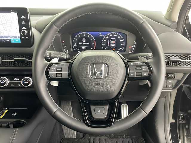 ホンダ ＺＲ－Ｖ Z 道央・札幌 2024(令6)年 0.4万km クリスタルブラックパール ・4WD/・寒冷地仕様/・純正ナビ&BT&USB&フルセグTV/・BOSEプレミアムサウンド/・マルチビューカメラシステム/・バックカメラ/・ホンダセンシング/・衝突軽減ブレーキ/・誤発進抑制機能/・後方誤発進抑制機能/・近距離衝突軽減ブレーキ/・歩行者事故低減ステアリング/・路外逸脱抑制機能/・渋滞追従機能付アダプティブクルーズコントロール/・車線維持支援システム/・トラフィックジャムアシスト/・先行車発進お知らせ機能/・標識認識機能/・ブラインドスポットインフォメーション/・パーキングセンサーシステム/・全席シートヒーター/・前席パワーシート/・D席シートメモリ/・レザーシート/・ステアリングヒーター/・パドルシフト/・置くだけ充電/・純正前方ドライブレコーダー/・ビルトインETC2.0/・LEDヘッドライト/・オートライト/・オートマチックハイビーム/・スマートキー/・スペアキー/・取扱説明書
