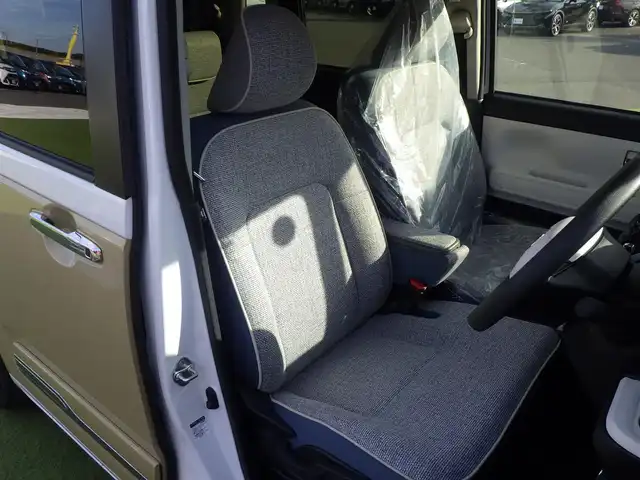 ダイハツ ムーヴ キャンバス ストライプス G 千葉県 2024(令6)年 0.5万km シャイニングホワイトパール/サンドベージュメタリック スマートアシストIII/エコアイドル/両側パワースライドドア/前席シートヒーター/純正メモリーナビ/地デジTV/【DVD/CD再生機能　Bluetooth接続】/バックカメラ/ステアリングスイッチ/LEDヘッドライト/フォグライト/コーナーセンサー/サイド/カーテンエアバッグ/キーフリーシステム