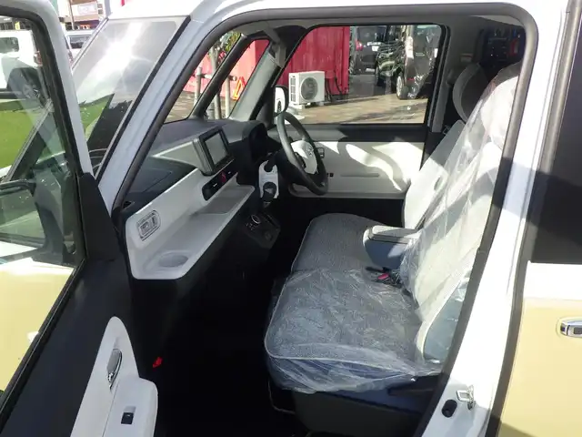 ダイハツ ムーヴ キャンバス ストライプス G 千葉県 2024(令6)年 0.5万km シャイニングホワイトパール/サンドベージュメタリック スマートアシストIII/エコアイドル/両側パワースライドドア/前席シートヒーター/純正メモリーナビ/地デジTV/【DVD/CD再生機能　Bluetooth接続】/バックカメラ/ステアリングスイッチ/LEDヘッドライト/フォグライト/コーナーセンサー/サイド/カーテンエアバッグ/キーフリーシステム