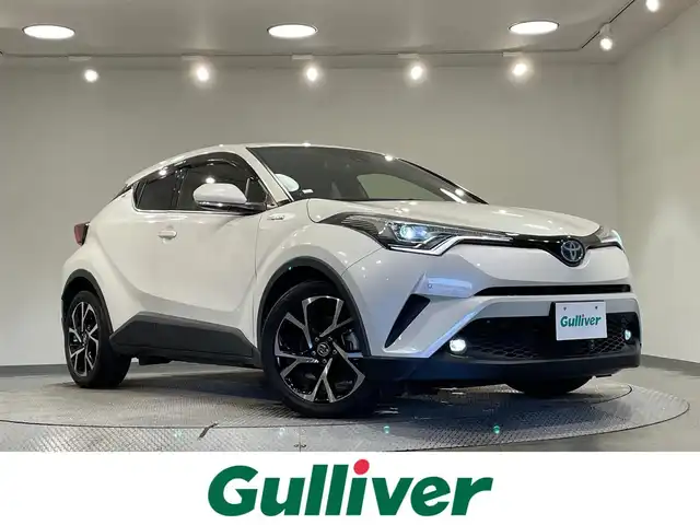 トヨタ Ｃ－ＨＲ G 愛知県 2019(平31)年 7.4万km ホワイトパールクリスタルシャイン 純正９インチナビ(NSZT-Y68T)/(AM/FM/DISC/フルセグTV/SD/Bluetooth/USB/HDMI)/トヨタセーフティセンス　/　　-衝突軽減ブレーキ　/　　-レーダークルーズコントロール　/　　-レーンディパーチャーアラート/　　-オートマチックハイビーム/ブラインドスポットモニター　/シートヒーター　/ビルトインＥＴＣ　/ＬＥＤヘッドライト/LEDフォグランプ　/ドライブレコーダー　/クリアランスソナー/HDMI端子/アクセサリーソケット/プッシュスタート/　　-スマートキー/純正フロアマット/純正18インチAW