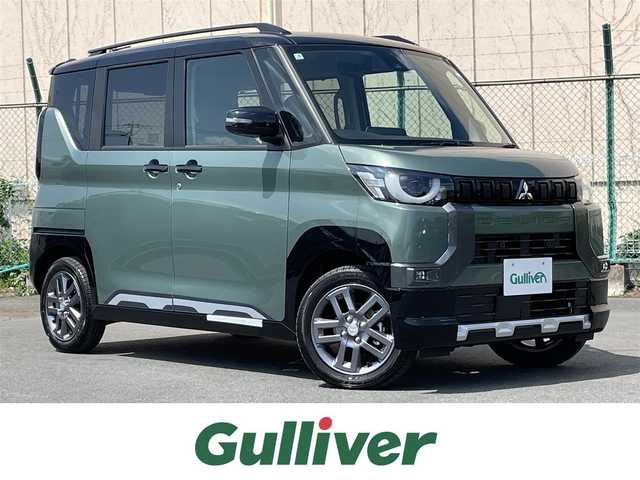 三菱 デリカミニ T プレミアム 東京都 2025(令7)年 0.1万km未満 緑 届出済未使用車/純正ディスプレイオーディオ/マルチアラウンドモニター/衝突被害軽減/車線逸脱警報/マイパイロット/シートヒーター/両側パワースライドドア/ステアリングヒーター/ステアリングスイッチ