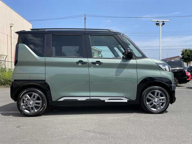 三菱 デリカミニ T プレミアム 東京都 2025(令7)年 0.1万km未満 緑 届出済未使用車/純正ディスプレイオーディオ/マルチアラウンドモニター/衝突被害軽減/車線逸脱警報/マイパイロット/シートヒーター/両側パワースライドドア/ステアリングヒーター/ステアリングスイッチ