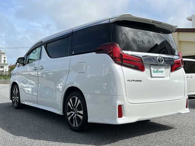 トヨタ アルファード S Cパッケージ 沖縄県 2018(平30)年 2万km ホワイトパールクリスタルシャイン 純正１０型ナビ/（ＡＭ／ＦＭ／ＣＤ／ＤＶＤ／ＢＴ）/フルセグＴＶ/ムーンルーフ/バックモニター/両側パワスラ/純正後席モニター/コーナーセンサー/パワーバックドア/シートヒーター/オットマン/パワーシート/衝突軽減/スマートキー/クルコン/ドラレコ/純正フロアマット/純正ドラレコ/スペアキー