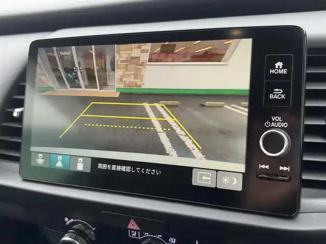 ホンダ フィット e:HEV RS 徳島県 2022(令4)年 2.4万km プラチナホワイトパール ホンダコネクトディスプレイ/　BT/ラジオ/フルセグ/USB/カープレイ/バックカメラ/ビルトインETC2.0/360°ドライブレコーダー/コーナーセンサー/LEDヘッドライト/ハーフレザーシート/オートリラミラー/純正フロアマット/ドアバイザー/パーキングセンサー警報/パドルシフト/オートブレーキホールド/新車時保証書/取扱説明書