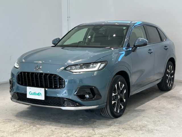 ホンダ ＺＲ－Ｖ ハイブリッド e:HEV Z 宮城県 2024(令6)年 0.5万km グレー BOSEサウンド/ホンダセンシング/・オートハイビーム/アダプティブドライビングビーム/・標識認識機能/・先行車発進お知らせ機能/・近距離衝突軽減ブレーキ/・後方接近車両探知/・マルチビューカメラシステム/・ドライバー注意力モニター/・先読みエコアシスト/ダウンヒルアシストコントロール/追従走行付きクルーズコントロール/レーンキープアシスト/前後コーナーセンサー/電動リアゲート/純正SDナビ/全方位車外バックカメラ/純正フルセグTV/Bluetooth接続/置き型充電/ハンドルヒーター/シートメモリー/全席シートヒーター/パワーシート/LEDヘッドライト/オートライト/純正ビルドインETC2.0/純正ドライブレコーダー/純正フロアマット/純正18インチアルミホイール/盗難防止装置