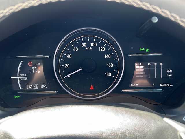 ホンダ ヴェゼル ハイブリッド Z ホンダセンシング 山形県 2020(令2)年 6.3万km プラチナホワイトパール ホンダセンシング/クルーズコントロール/純正8インチナビ/（フルセグTV/Bluetooth/CD/DVD）/Apple Car-Play/バックカメラ/ドライブレコーダー/ビルトインETC/ワイパーデアイサー/ステアリングスイッチ/パドルシフト/ハーフレザーシート/前席シートヒーター/純正17インチAW/モデューロエアロ/LEDヘッドライト/オートライト/フォグランプ/革巻きステアリング/電動パーキングスイッチ/スマートキー×２/保証書/禁煙車