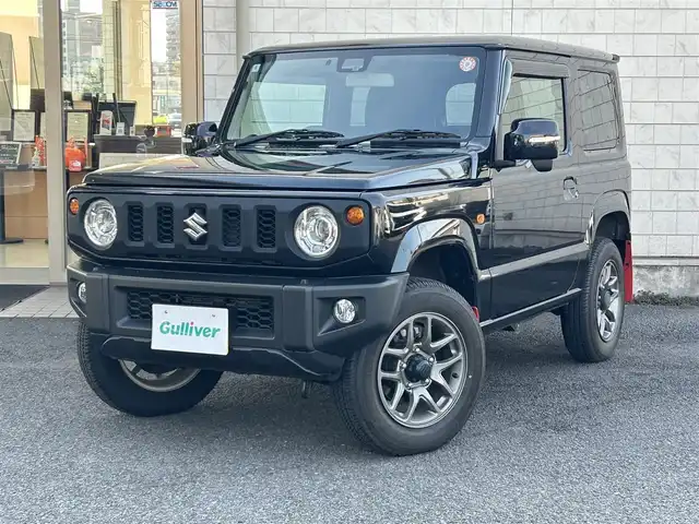 スズキ ジムニー XC 大分県 2022(令4)年 0.3万km ブルーイッシュブラックパール3 商品登録時：2738キロ/純正ナビ（SKX-S809）/【フルセグTV/Bluetooth/DVD/CD/SD】/ETC/バックカメラ/クルーズコントロール/車線逸脱警報機能/誤発進抑制機能/デュアルセンサーブレーキサポート/ふらつき警報機能/シートヒーター（D/N席）/LEDヘッドライト/アイドリングストップ/電動格納ウィンカーミラー/プッシュスタート/革巻ステアリング/ステアリングスイッチ/シガーソケット/オートマチックハイビーム/フォグランプ/純正フロアマット/保証書/取説
