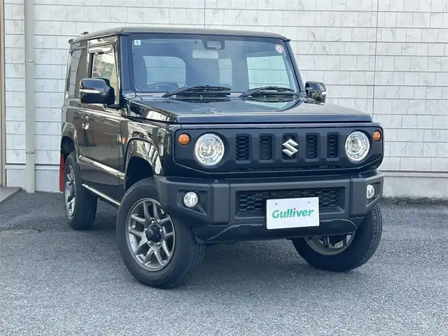スズキ ジムニー XC 大分県 2022(令4)年 0.3万km ブルーイッシュブラックパール3 商品登録時：2738キロ/純正ナビ（SKX-S809）/【フルセグTV/Bluetooth/DVD/CD/SD】/ETC/バックカメラ/クルーズコントロール/車線逸脱警報機能/誤発進抑制機能/デュアルセンサーブレーキサポート/ふらつき警報機能/シートヒーター（D/N席）/LEDヘッドライト/アイドリングストップ/電動格納ウィンカーミラー/プッシュスタート/革巻ステアリング/ステアリングスイッチ/シガーソケット/オートマチックハイビーム/フォグランプ/純正フロアマット/保証書/取説