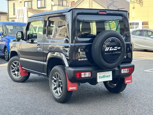スズキ ジムニー XC 大分県 2022(令4)年 0.3万km ブルーイッシュブラックパール3 商品登録時：2738キロ/純正ナビ（SKX-S809）/【フルセグTV/Bluetooth/DVD/CD/SD】/ETC/バックカメラ/クルーズコントロール/車線逸脱警報機能/誤発進抑制機能/デュアルセンサーブレーキサポート/ふらつき警報機能/シートヒーター（D/N席）/LEDヘッドライト/アイドリングストップ/電動格納ウィンカーミラー/プッシュスタート/革巻ステアリング/ステアリングスイッチ/シガーソケット/オートマチックハイビーム/フォグランプ/純正フロアマット/保証書/取説