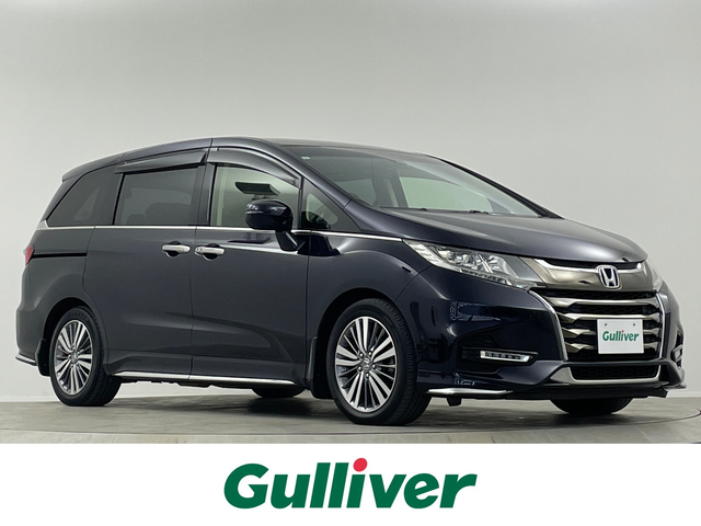 ホンダ オデッセイ アブソルート ホンダセンシング 埼玉県 2019(令1)年 6.2万km プレミアムヴィーナスブラックP 禁煙　純正９型ナビ　Ｂカメラ　９型後席モニター　両側電動　ＥＴＣ　オットマン　Ｂｌｕｅｔｏｏｔｈ　ＴＶ　前後ドライブレコーダー　レーダークルーズコントロール　レーンキープアシスト　衝突軽減システム