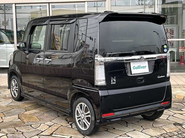 ホンダ Ｎ ＢＯＸ カスタム G Aパッケージ 静岡県 2015(平27)年 13万km プレミアムゴールドパープルパール 【安全装備】/CTBA（シティブレーキアクティブシステム）/車速5km/h~30km/hにてレーザーセンサーが前方の車両を検知。/横滑り防止機能/バックカメラ/【主要装備】/社外ＳＤナビ　/片側パワースライドドア　/プッシュスタート　/スマートキー　/チップアップシート　/純正１４インチアルミホイール　/ＥＴＣ車載器　/スペアキー有り　/横滑り防止機能　
