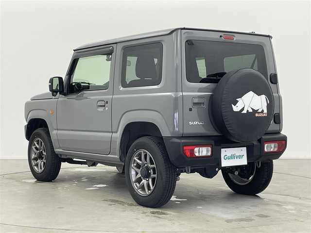 スズキ ジムニー XC 富山県 2022(令4)年 2万km ミディアムグレー 4WD/ワンオーナー/純正SDナビ（CN-RZ775W）/地図SD未着のため動作未確認/クルーズコントロール/レーンアシスト/ドライブレコーダー/前席シートヒーター/アイドリングストップ/プッシュスタート/スマートキー/ステアリングスイッチ/ダウンヒルアシストコントロール/衝突被害軽減システム/盗難防止装置/横滑り防止装置/純正16インチAW/純正ドアバイザー/LEDヘッドライト