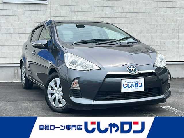 トヨタ アクア G ブラックソフトレザーセレ 長野県 2014(平26)年 9.8万km グレーメタリック (株)IDOMが運営する【じしゃロン長野店】の自社ローン専用車両になります/こちらは現金またはオートローンご利用時の価格です。自社ローンご希望の方は別途その旨お申付け下さい./純正オーディオ（CD　ラジオ）/スマートキープッシュスタート/運転席助手席シートヒーター/ETC/純正ホイールキャップ/電動格納ミラー