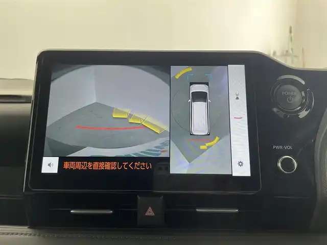 トヨタ ヴォクシー ハイブリッド S－Z 大分県 2024(令6)年 1.4万km アティチュードブラックマイカ ワンオーナ/純正10.5インチディスプレイオーディオ/（AM/FM/CD/DVD/Bluetooth/フルセグ）/快適利便パッケージ/・後席シートヒータ/・後席オットマン/・パワーバックドアー/トヨタセーフティーセンス/・衝突被害軽減ブレーキ/・車線逸脱抑制装置/・レーダークルーズコントロール/・オートマチックハイビーム/・BSM/純正フリップダウンモニター/両側電動スライドドア/前後ドライブレコーダー/クリアランスソナー/オートブレーキホールド/ETC2.0/AC100V/純正17インチAW/3眼LEDヘッドライト/スマートキー