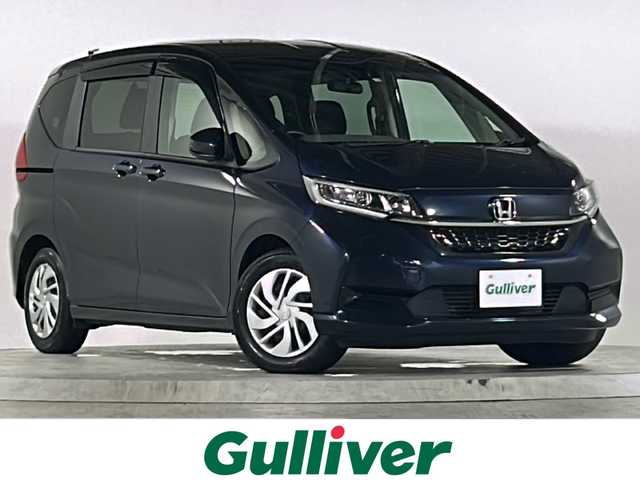 ホンダ フリード G ホンダセンシング 広島県 2020(令2)年 5.3万km ミッドナイトブルービームM 禁煙車/ホンダセンシング/・衝突軽減ブレーキ〈CMBS〉/・誤発進抑制機能/・ACC〈アダプティブ・クルーズ・コントロール〉/・LKAS〈車線維持支援システム〉/・歩行者事故低減ステアリング/・路外逸脱抑制機能/・先行車発進お知らせ機能/・標識認識機能/LEDヘッドライト＋LEDアクティブコーナリングライト/リアコーナーセンサー/両側パワースライドドア/純正ナビ（VXM-205Ci）/・フルセグ/CD/DVD/Bluetooth/SD/バックカメラ/オートリトラミラー/純正前後ドライブレコーダー/ドアバイザー/ETC/スマートキー/プッシュスタート/スペアキー